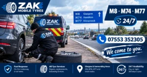 Zak Mobile Tyres fitter attending a car safely on a Glasgow motorway near the M8, M74 and M77 with 24/7 roadside service
